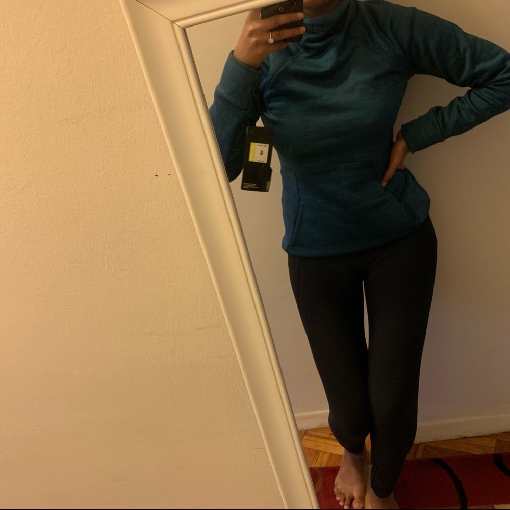 Athletic green sweater